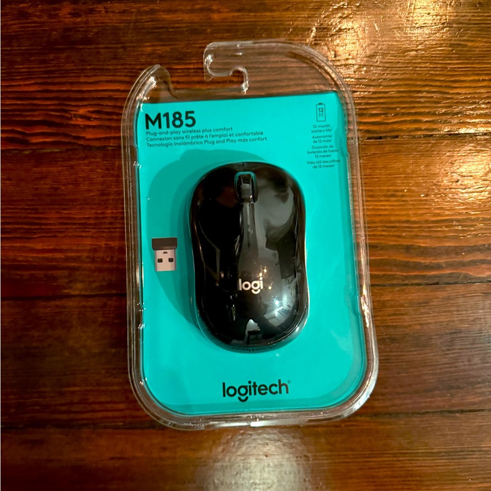 NEW in original package Logitech M185 Bluetooth mouse with transmitter. NIB